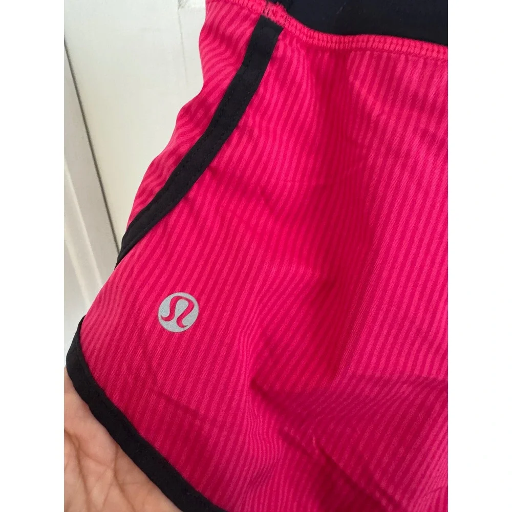 Lululemon pink & black shorts size 4.